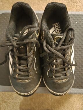 adidas Black Sneakers with White Stripes and Gold Accents
